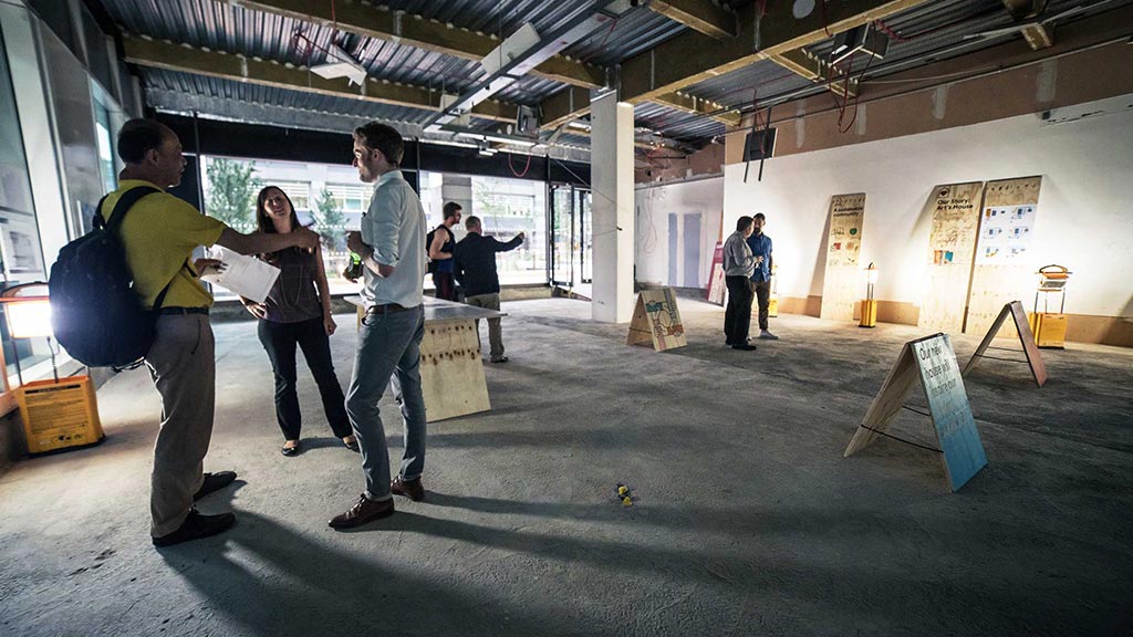 A group of people in a room.