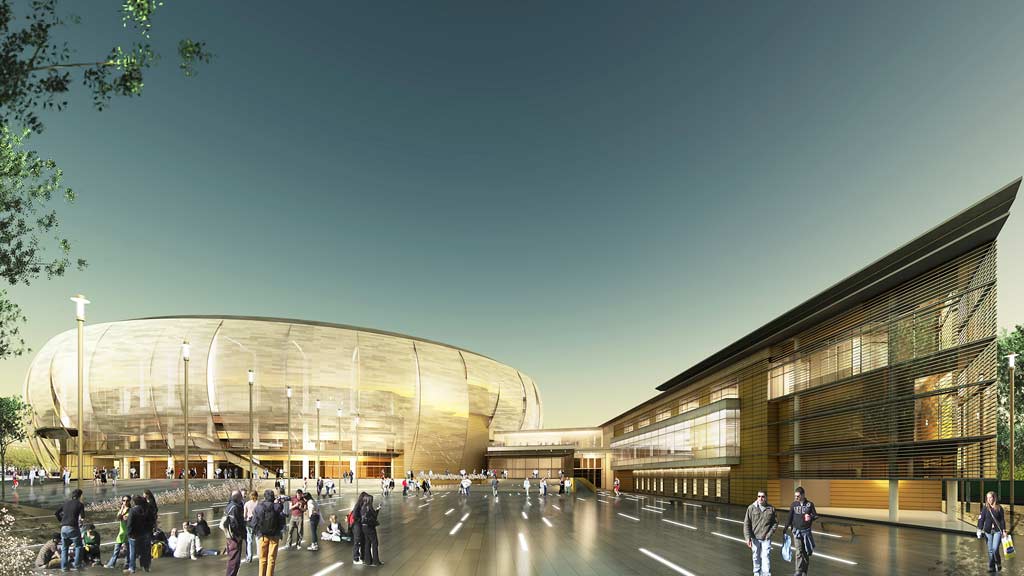 A group of people walking outside of a building.