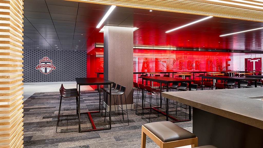 A room with tables and chairs.