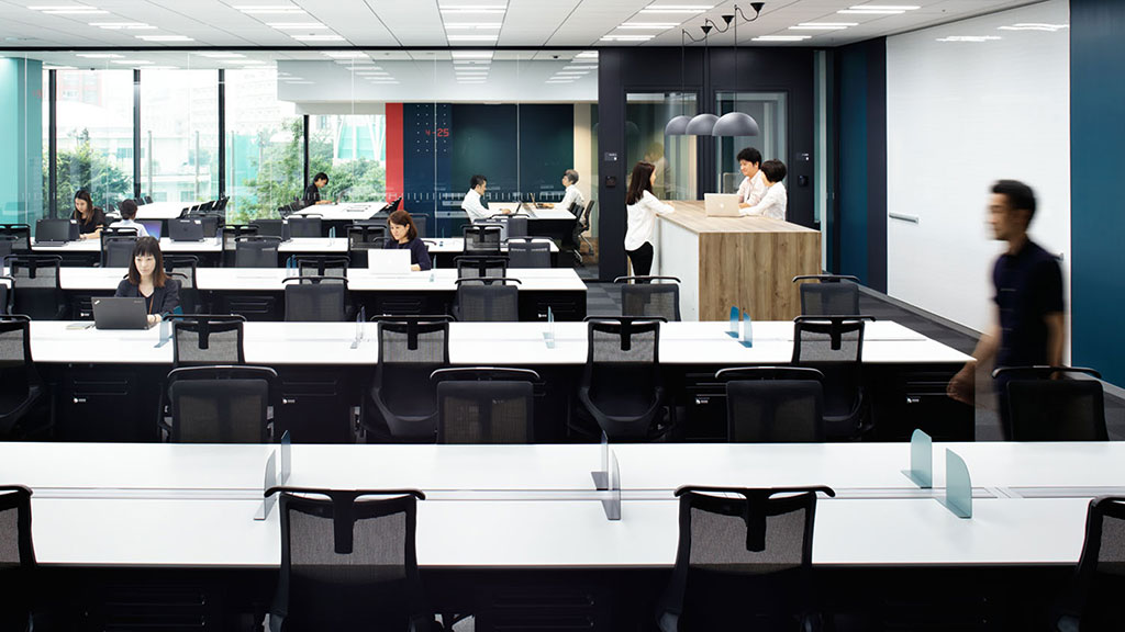 A group of people in a conference room.