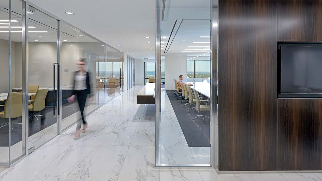 A person walking through a building.