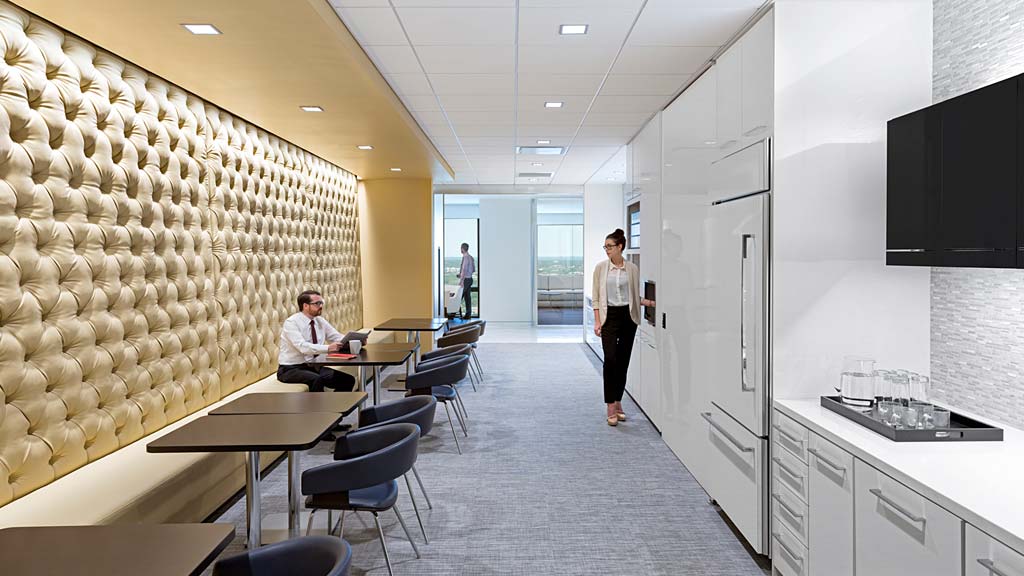 A man and woman in an office.