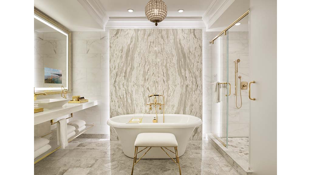 A bathroom with a tub and sink.