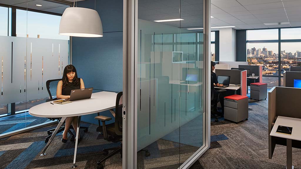 A person working on the laptop.