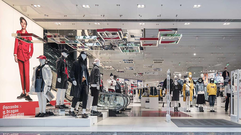 A group of mannequins in a store.