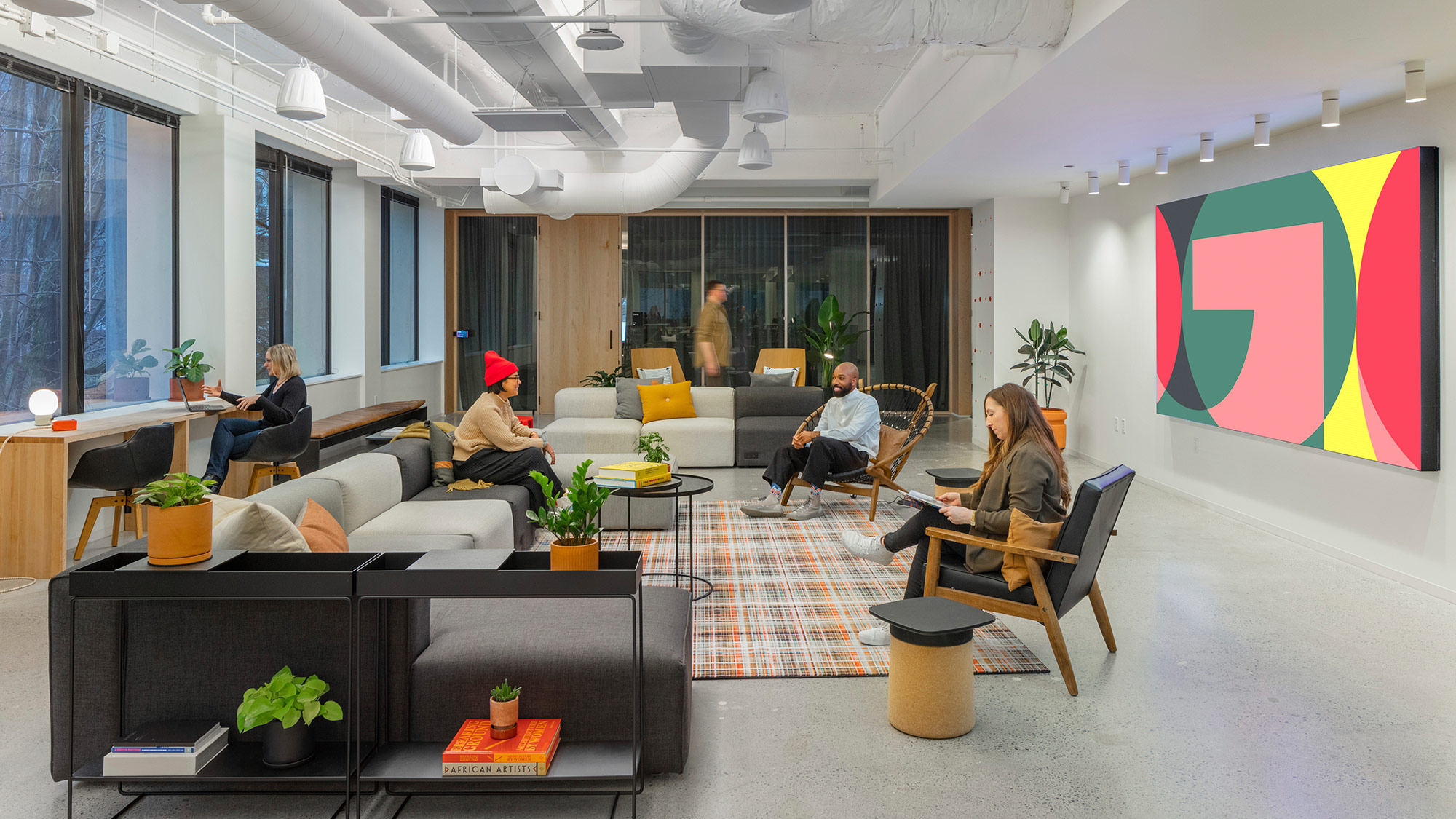 A group of people sitting in a room.