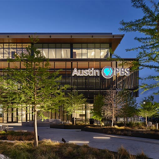 A building with trees in front of it.