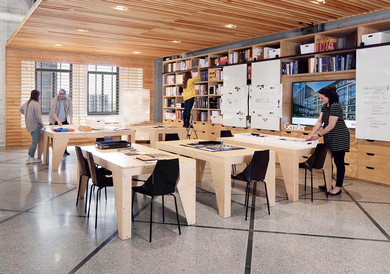 A group of people in a library.