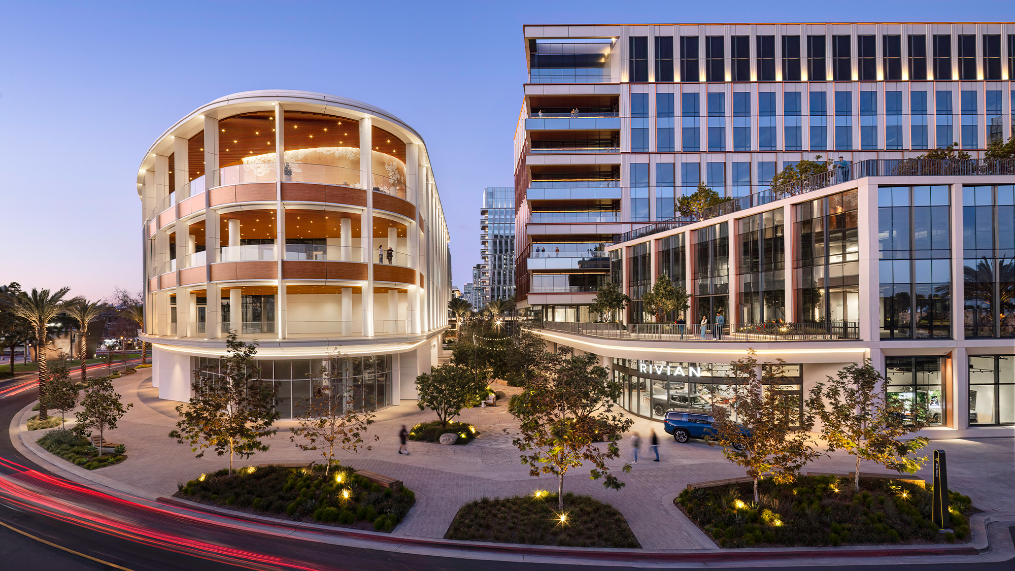 A building with a courtyard and trees.