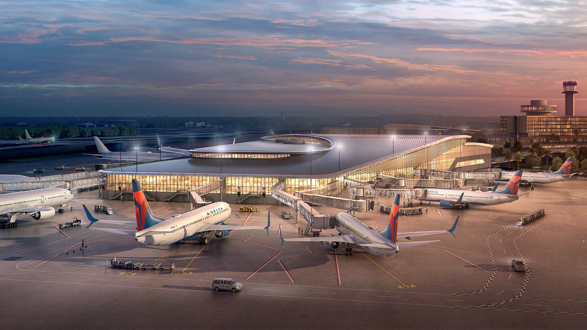 A group of airplanes at an airport.