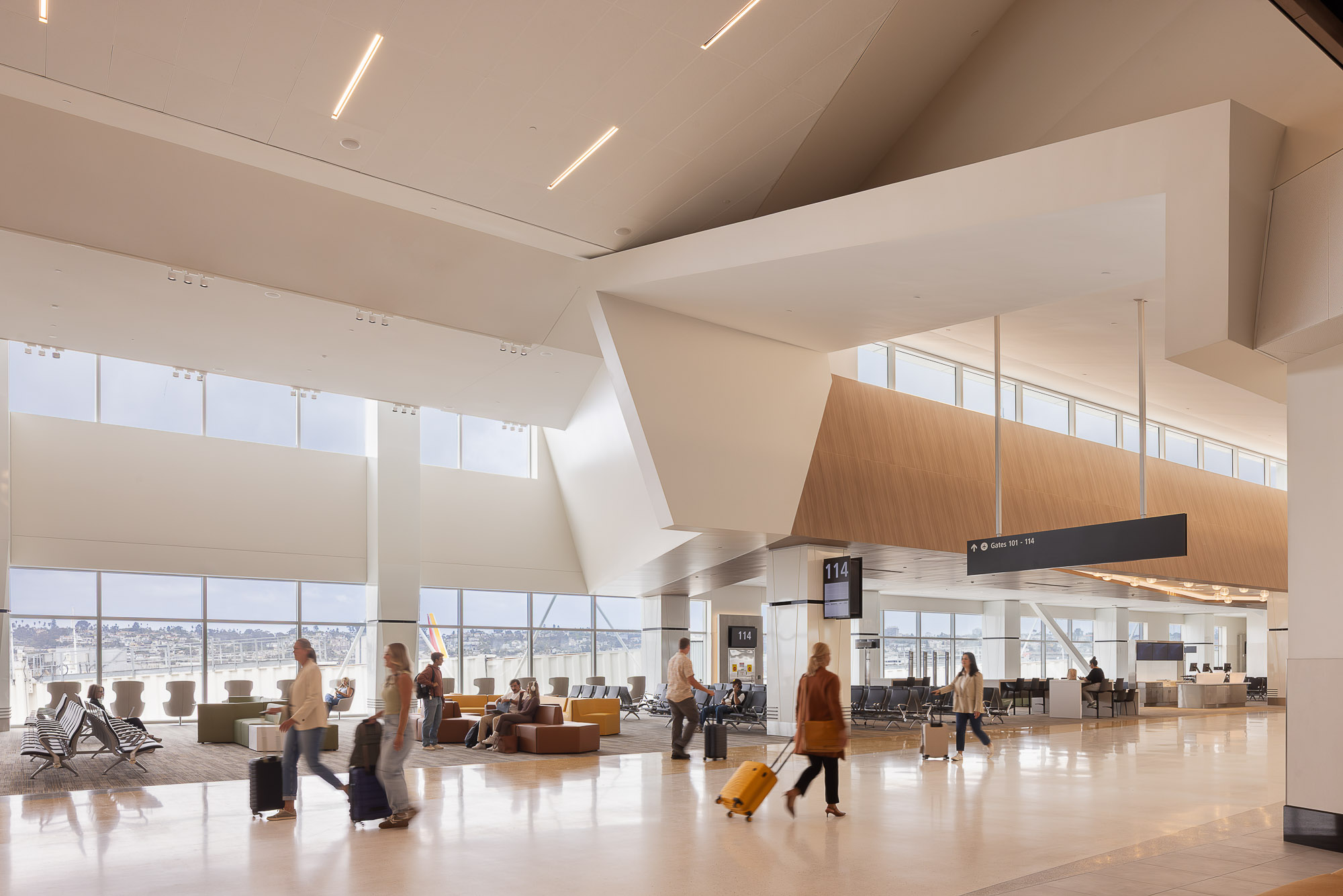 A group of people in an airport.