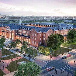 A large building with a parking lot.