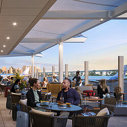 People sitting at tables in a restaurant.