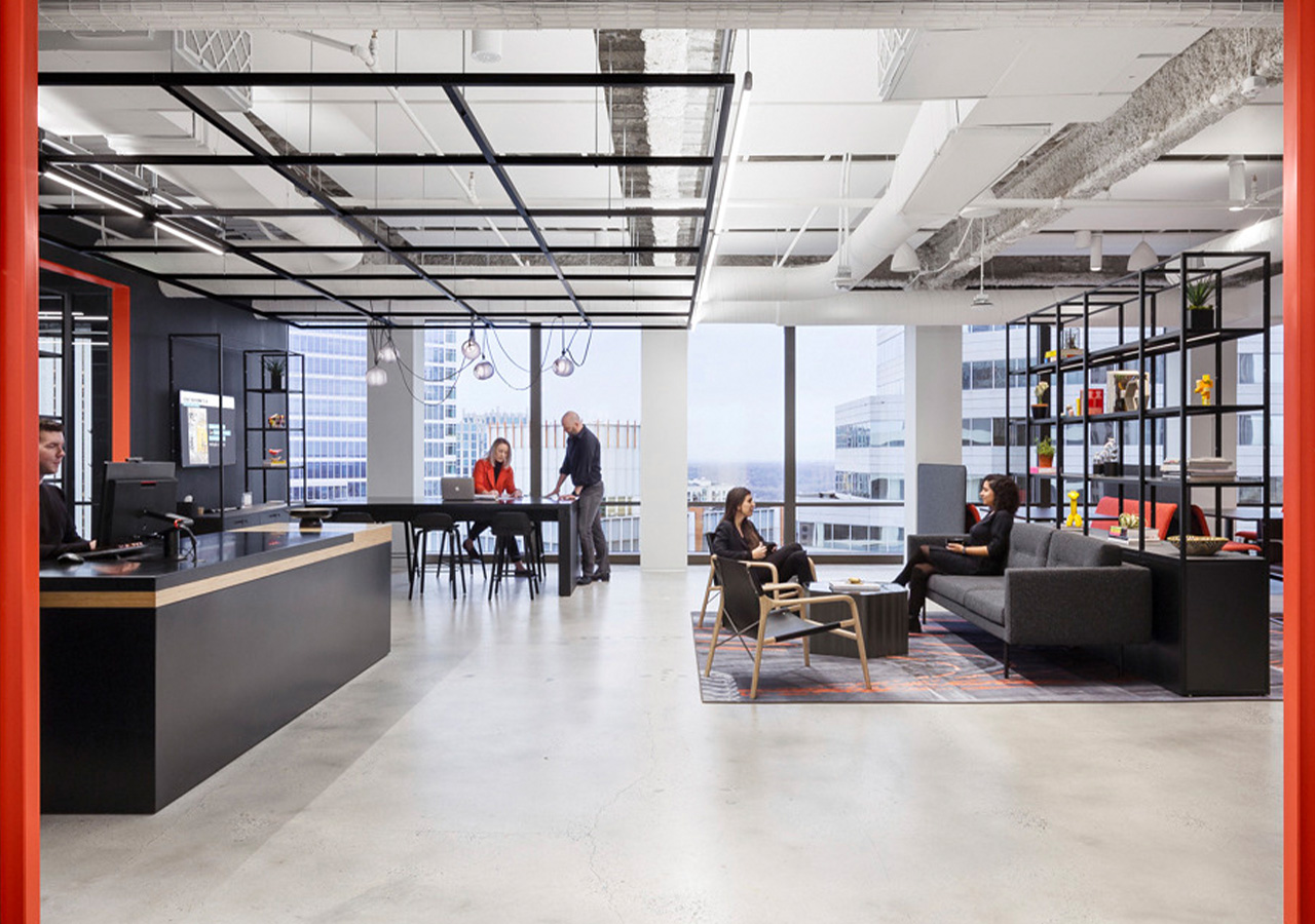 A group of people in an office.
