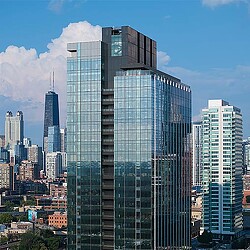 A tall building with many windows.