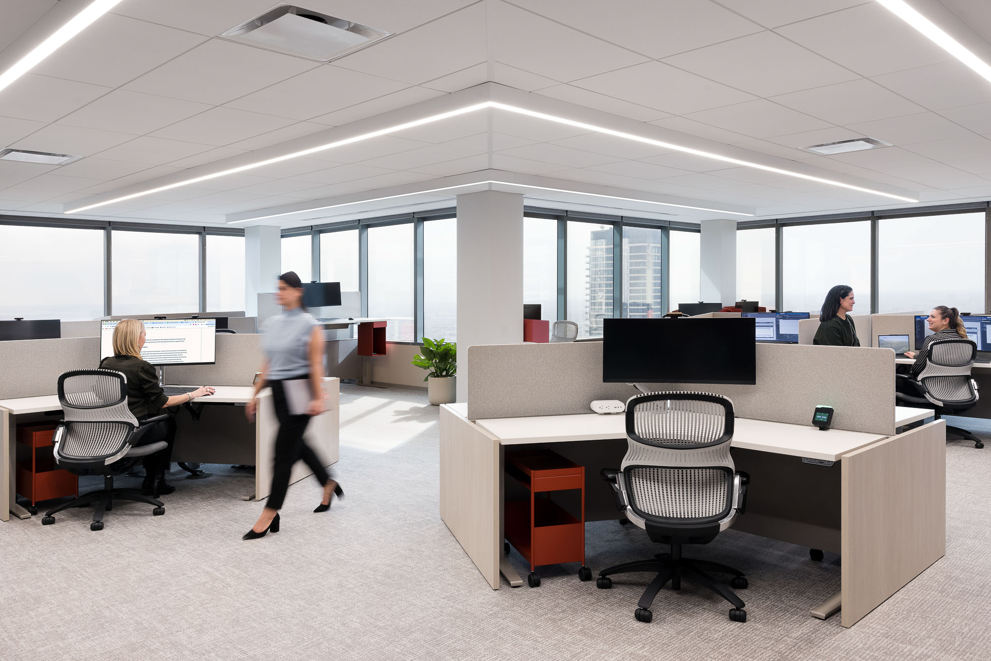 A group of people in an office.