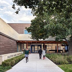 People walking outside a building.