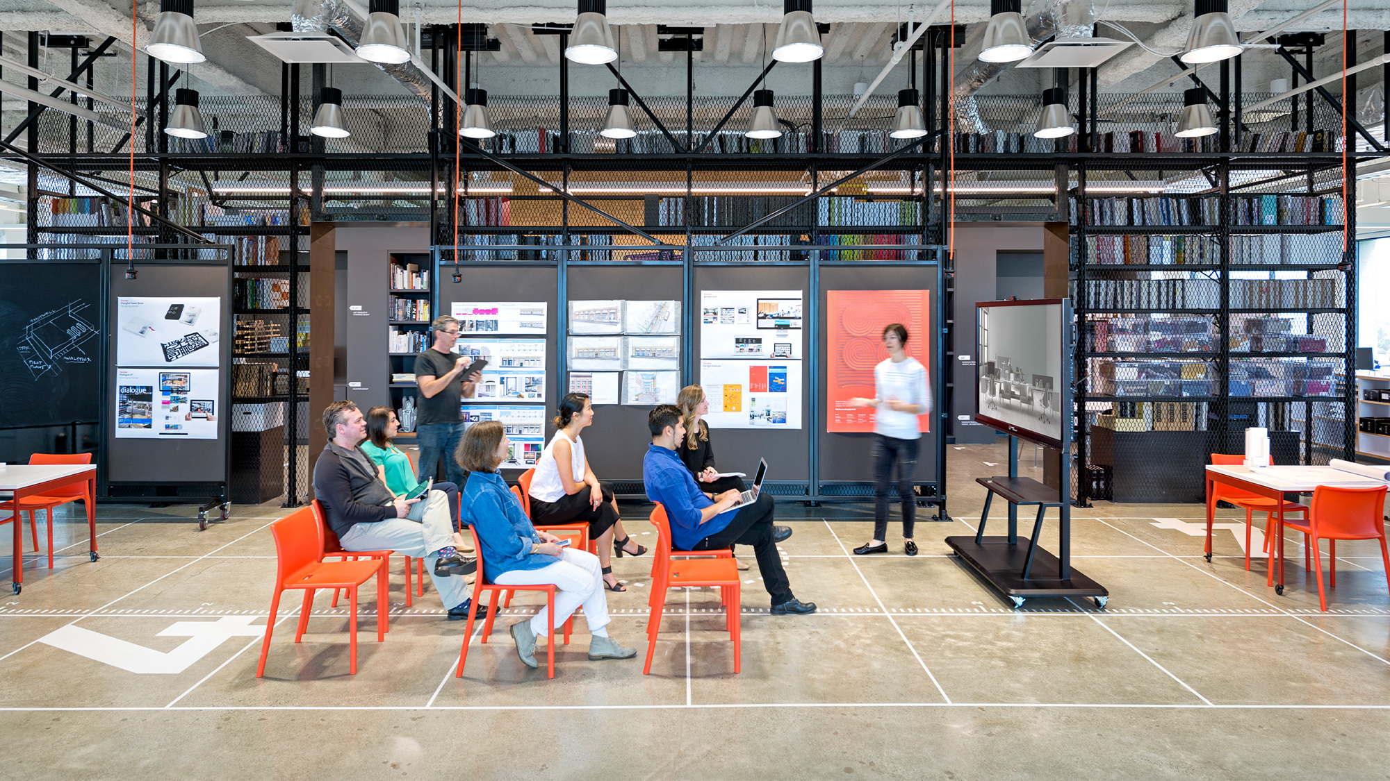 A group of people sitting in chairs.
