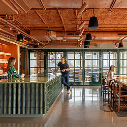 A person walking in a room.