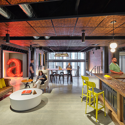 A group of people in a restaurant.