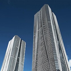 A couple of skyscrapers with Aon Center in the background.
