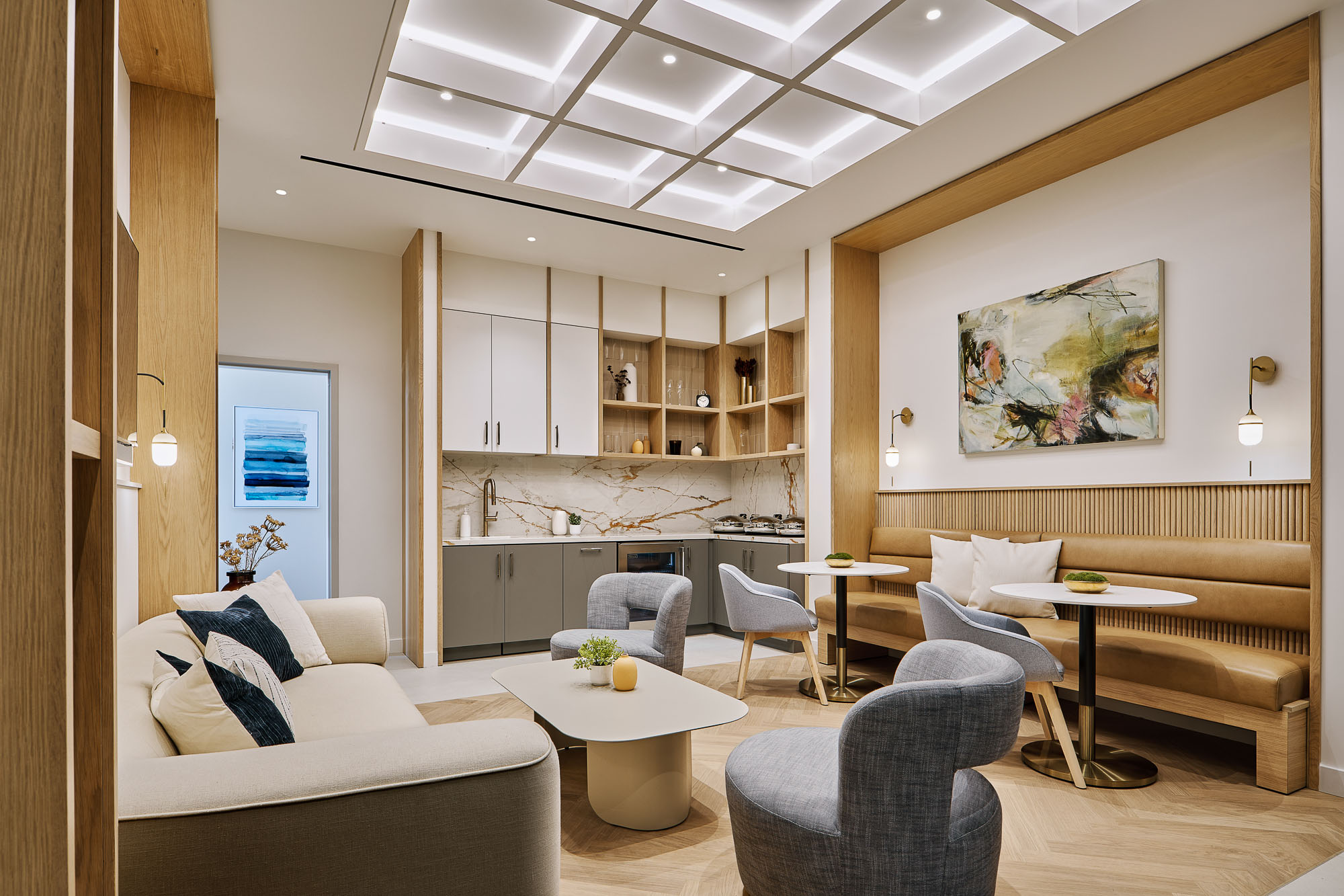 A living room with a couch and chairs.