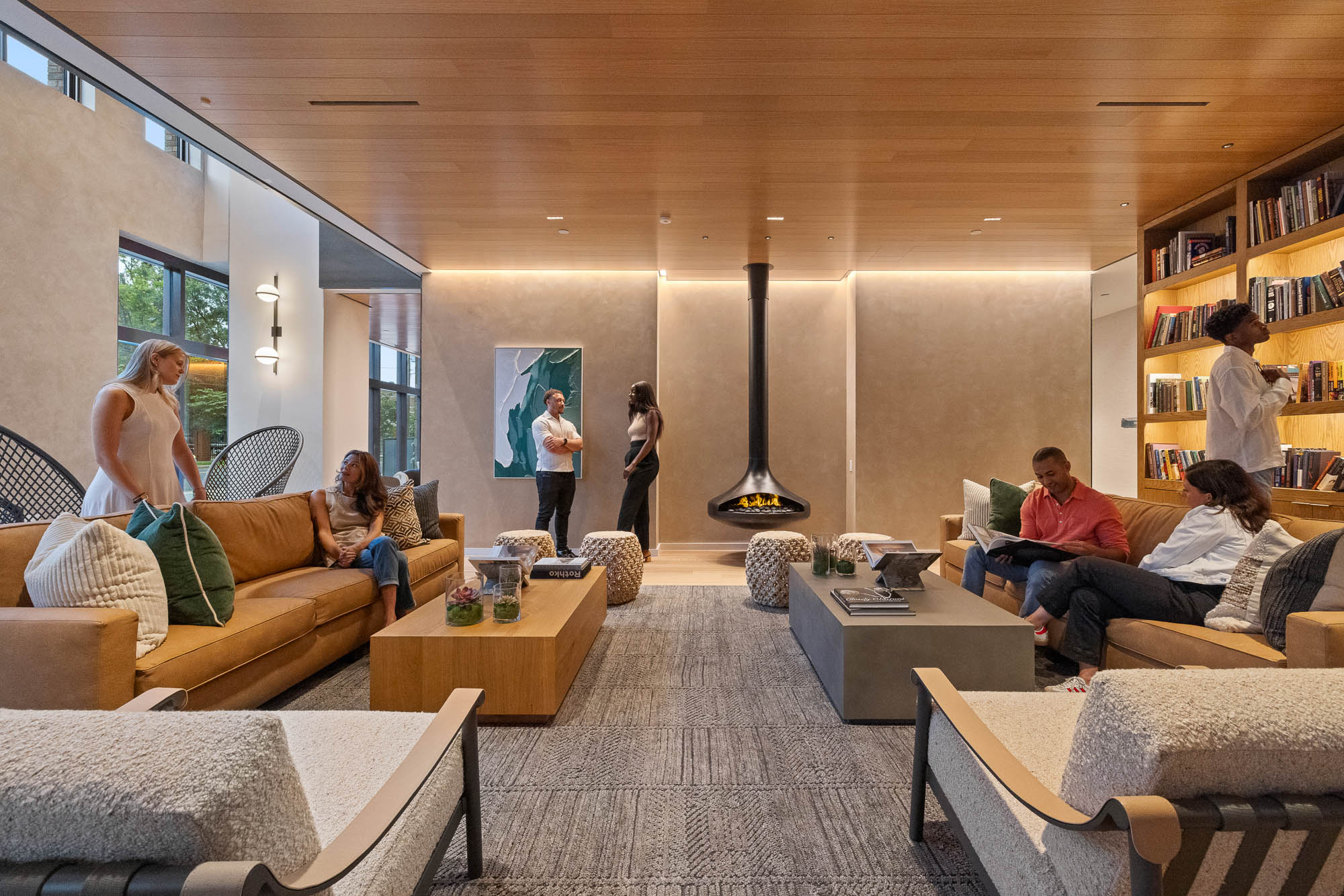 A group of people in a living room.