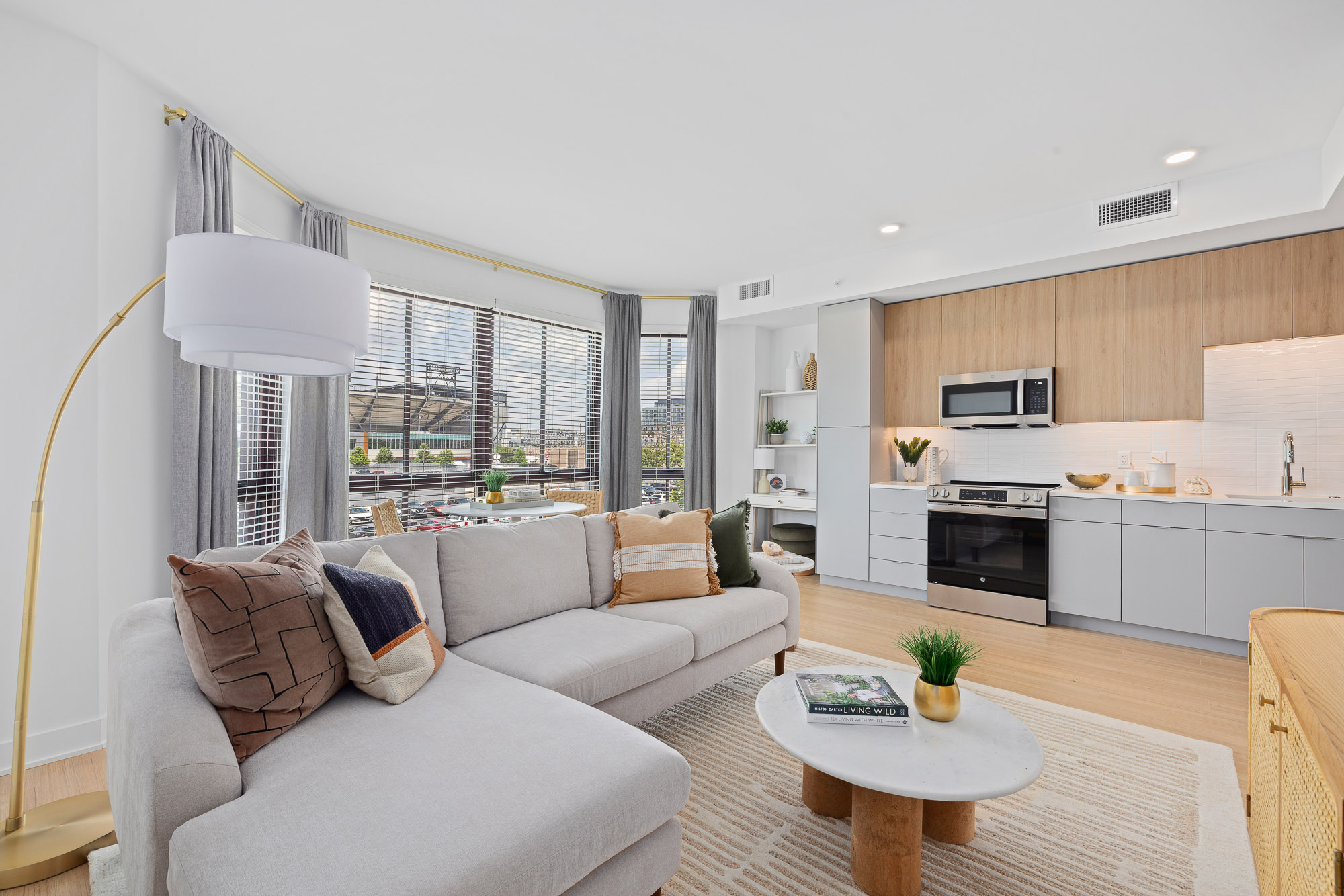 A living room with a couch and a table.