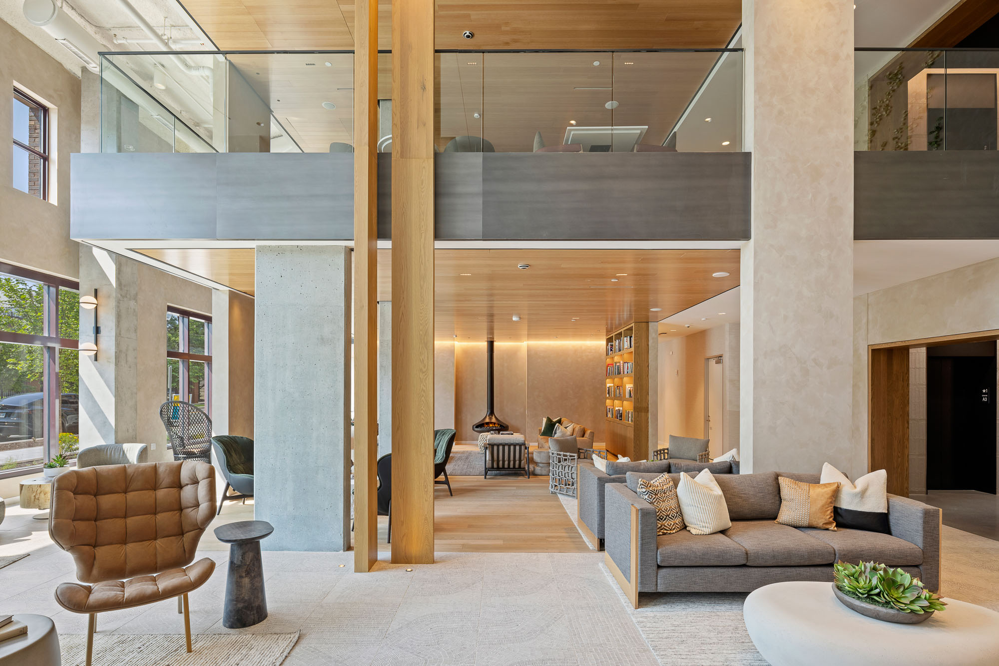 A large room with a large glass ceiling and a large white pillar.