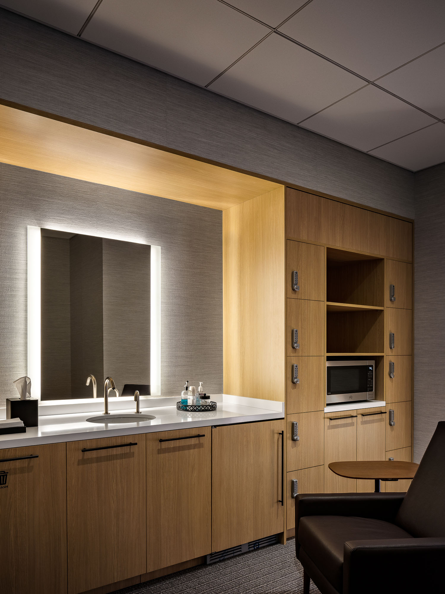 A kitchen with a large window.