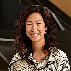 A person smiling for the camera.