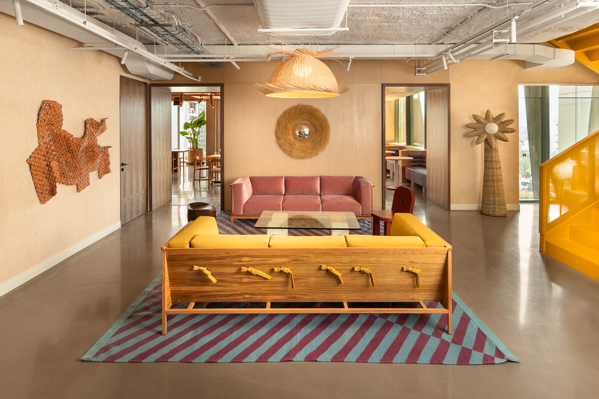 A room with a couch and a table.