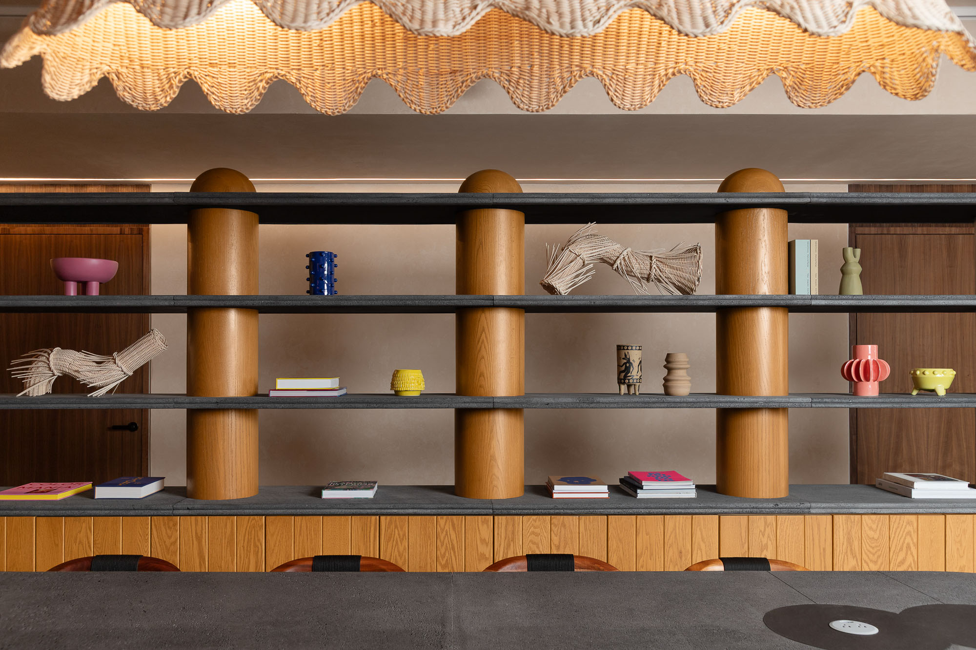 A shelf with objects on it.