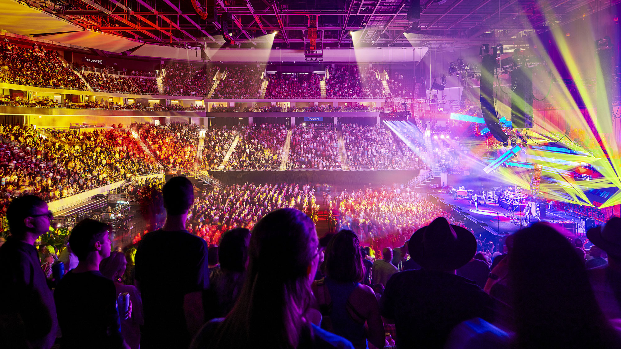A crowd of people in a stadium.