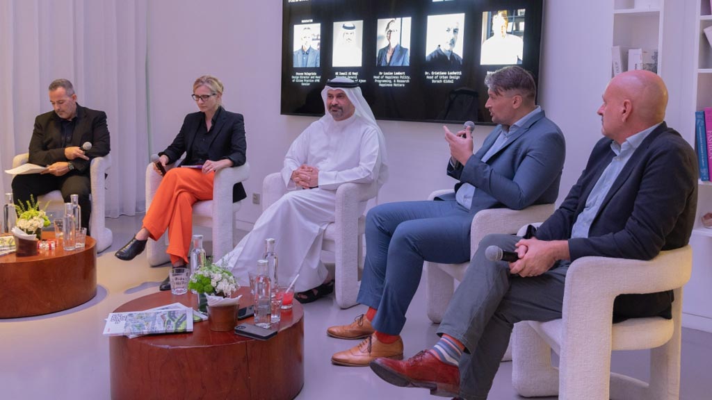 A group of men sitting in chairs.