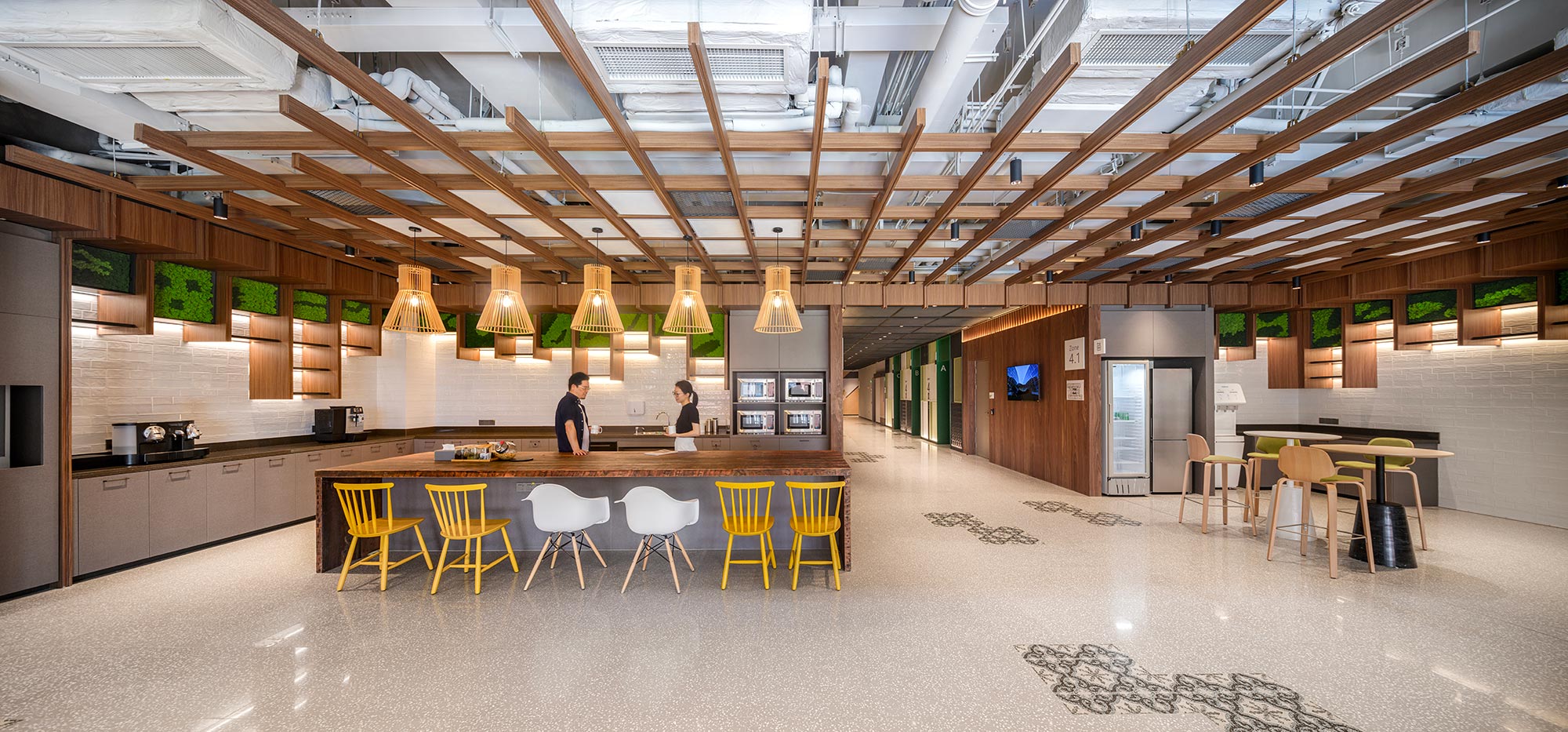 A large room with tables and chairs.
