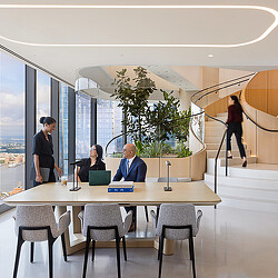 A group of people in a conference room.
