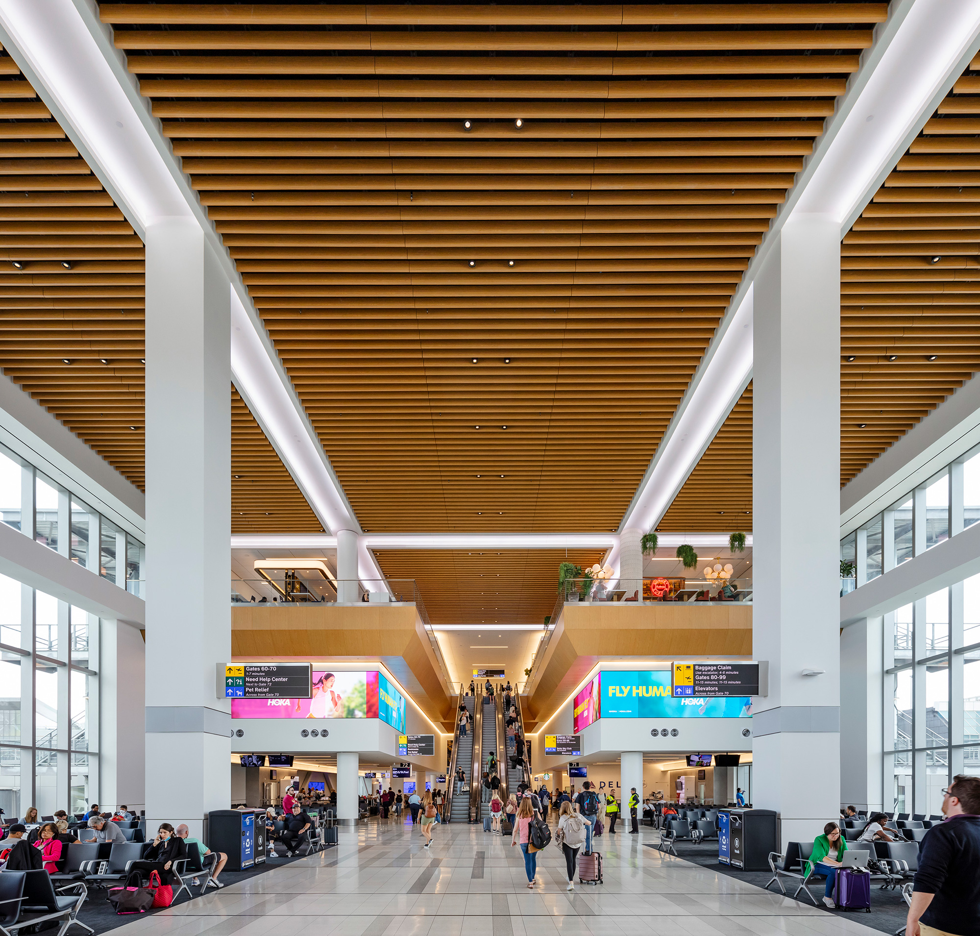 A large building with people walking around.