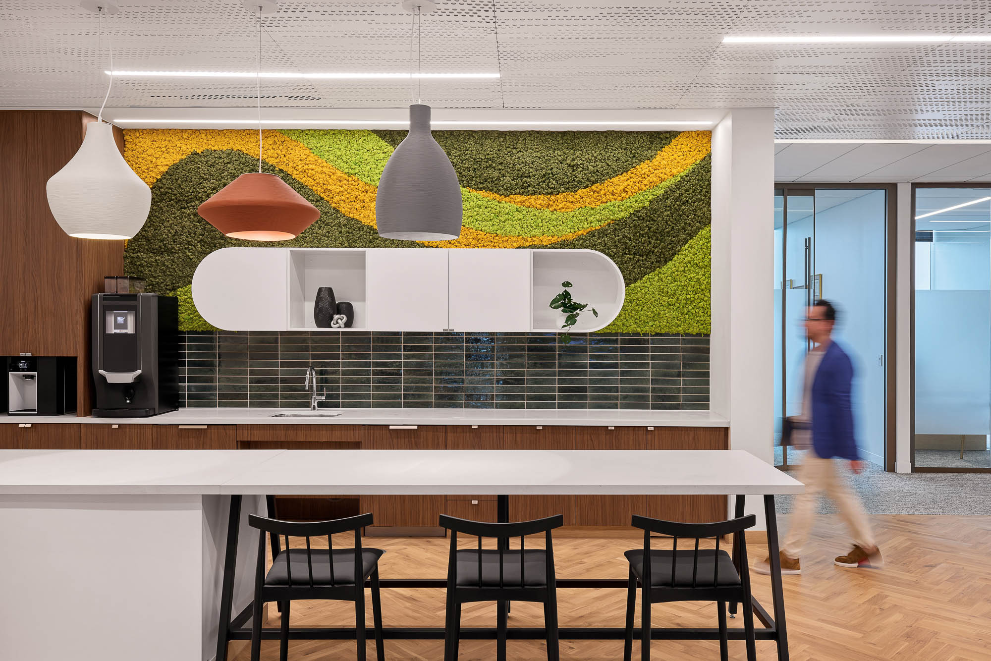 A person walking in a large room.