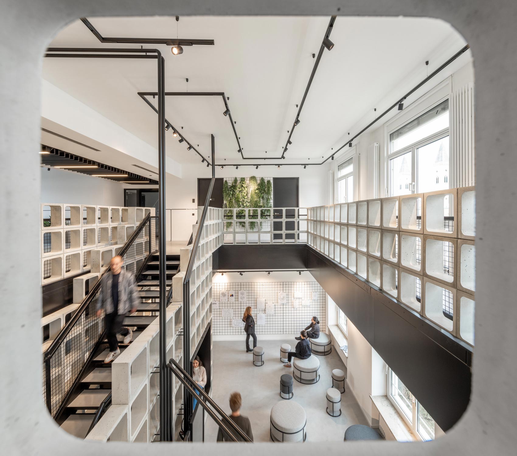 People walking up a staircase.