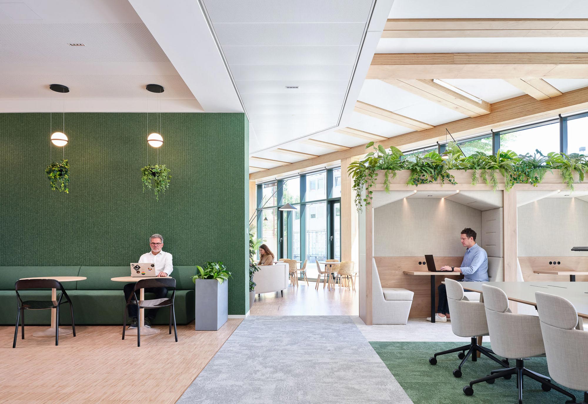 A few people sitting at a table.