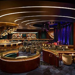 A room with tables and chairs.