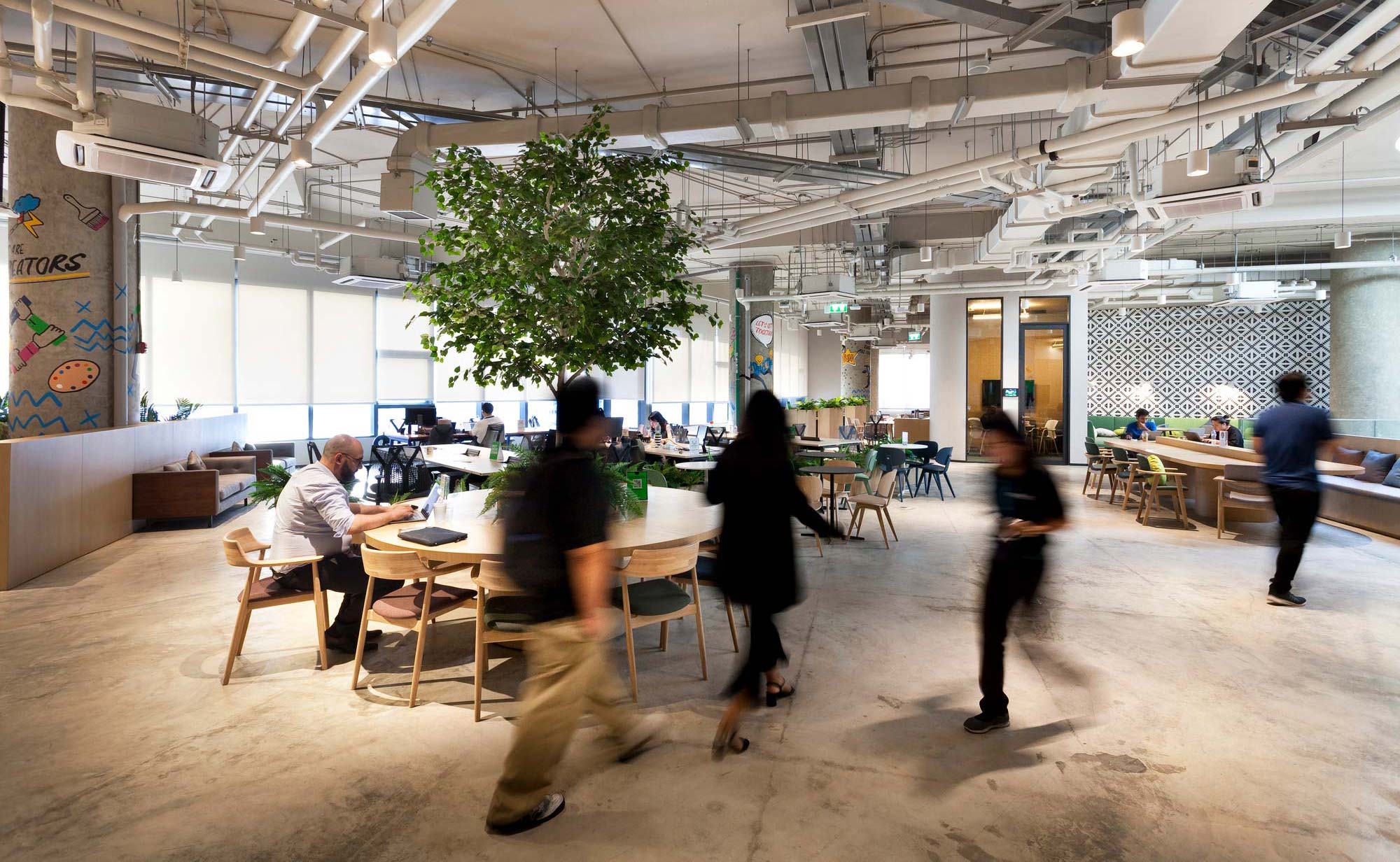 A group of people in a room.