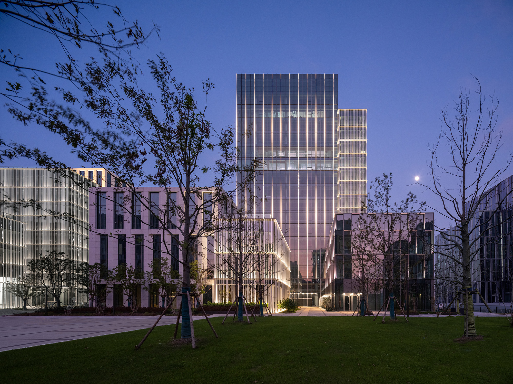 A building with a grass lawn.