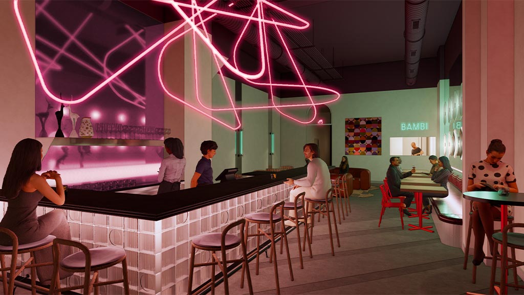 A group of people sitting at a bar.