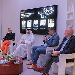 A group of people sitting in chairs.