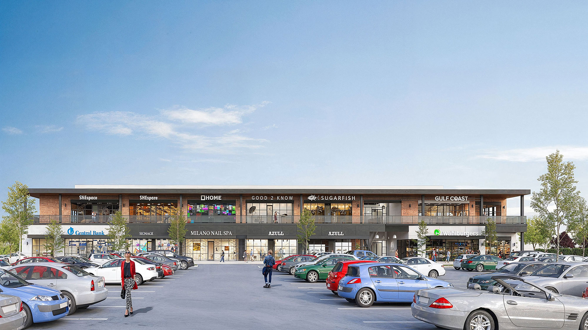 A parking lot with cars and people.