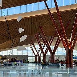 A large room with a large red structure in it.