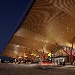 A large building with a large roof.