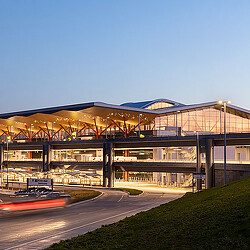 A building with a large roof.